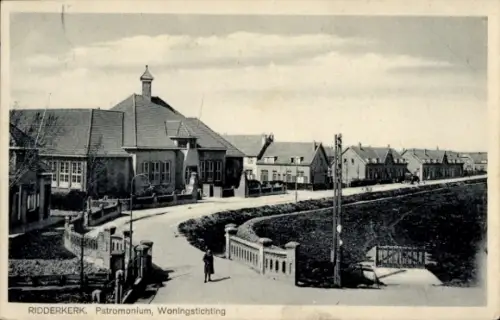 Ak Ridderkerk Südholland Niederlande, RIDDERKERK, Patromonium, Woningstichting, Straße mit Häuser