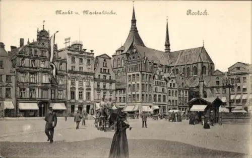 Ak Hansestadt Rostock, Macht u. Marienkirche,  Gebäude, Menschen, Pferdewagen