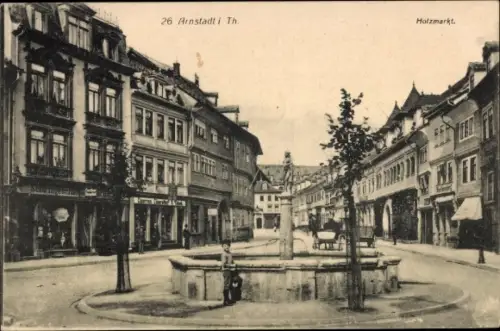Ak Arnstadt in Thüringen, Holzmarkt, Brunnen, Geschäftshäuser