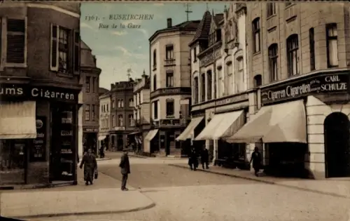 Ak Euskirchen Nordrhein Westfalen,  Rue de la Gare, Geschäfte, Menschen auf der Straße