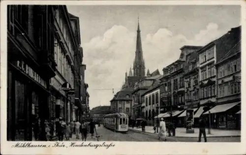 Ak Mühlhausen in Thüringen,  Hindenburgstrasse, Straßenbahn, Menschen, Geschäfte