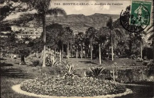 Ak Monte Carlo Monaco, Jardins du Casino,  Palmen, Gartenlandschaft, Hotel im Hintergrund