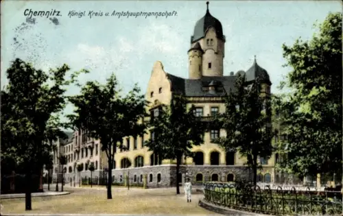Ak Chemnitz in Sachsen, Vorderseite zeigt eine  Gebäudeansicht, farbig, Schlossartiger Bau
