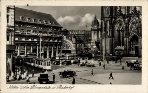 Ak Köln am Rhein,  Domplatz, Bahnhof, Straßenbahnen, Autos, Menschen