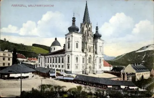 Ak Mariazell Steiermark, Wallfahrtskirche,  Berge, Wolken