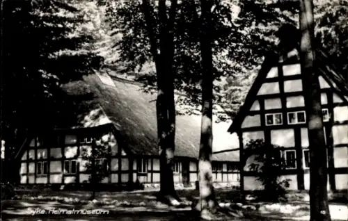 Ak Syke in Niedersachsen, Syke Heimatmuseum, Fachwerkhäuser, Bäume, Schwarz-Weiß-Foto