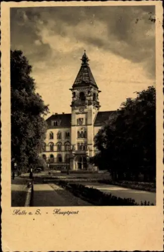 Ak Halle an der Saale, Hauptpostgebäude, Gebäude mit Turm, Bäume im Vordergrund