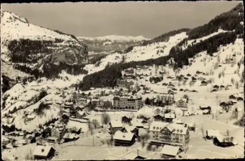 Ak Wengen Kanton Bern, Schneebedeckte Berge,  Winterlandschaft, viele Häuser