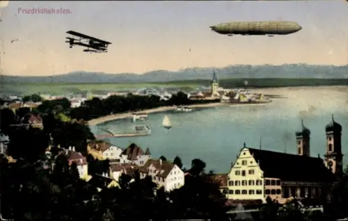 Ak Friedrichshafen am Bodensee, Luftaufnahme, Zeppelin über der Stadt, Doppeldecker