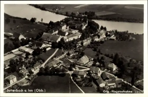 Ak Jettenbach am Inn Oberbayern, Luftaufnahme von  Fluss, Gebäude, Landschaft