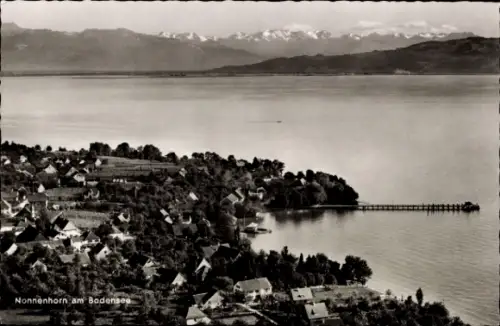 Ak Nonnenhorn am Bodensee, Bodensee, Nonnenhorn, Berge im Hintergrund, Wasser, Häuser