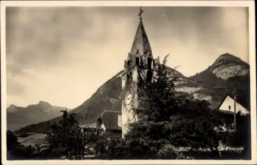Ak Aigle Kanton Waadt, Kirchturm, Berge, Bäume,  aus Aigle