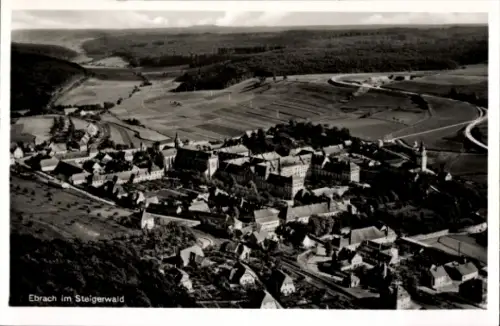 Ak Ebrach im Steigerwald Oberfranken, Luftaufnahme von  Steigerwald, Landschaft,  Gebäude