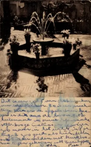 Ak Mérida Mexiko, Brunnen mit Pflanzen, Schwarz-Weiß-Foto, Text in Niederländisch