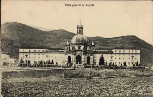 Ak Loyola Baskenland Spanien, Ansicht des Gebäudes in  Berglandschaft im Hintergrund