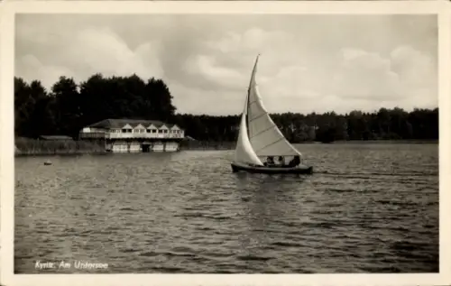 Ak Kyritz in der Prignitz, See mit Segelboot, Uferhaus, bewölkter Himmel