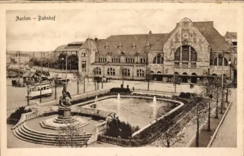 Ak Aachen in Nordrhein Westfalen, Bahnhof, Vorplatz, Straßenbahn, Denkmal
