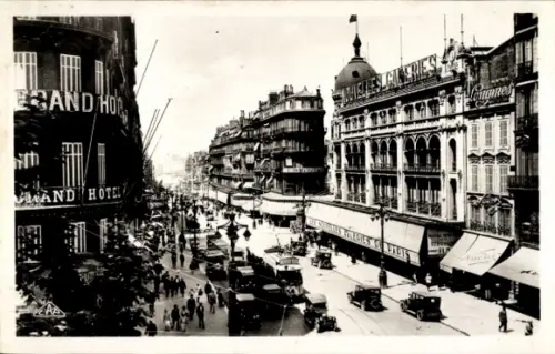 Ak Marseille Bouches du Rhône, Straße mit Autos, Grand Hotel, Geschäfte,  La Canebière