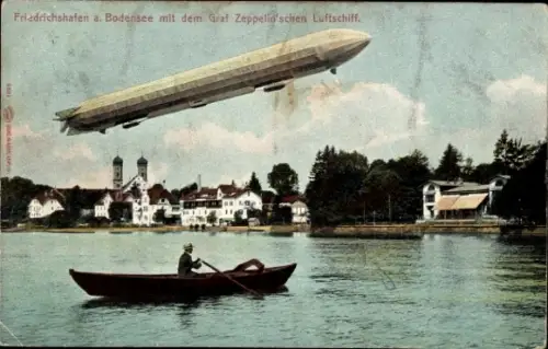 Ak Friedrichshafen am Bodensee, Zeppelin, Ruderboot, Blick auf den Ort
