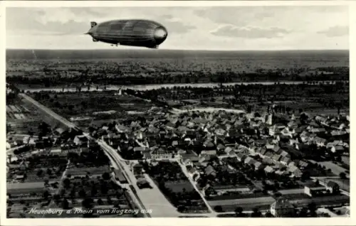 Ak Neuenburg am Rhein Baden, Luftaufnahme von  Zeppelin im Himmel, Fluss sichtbar