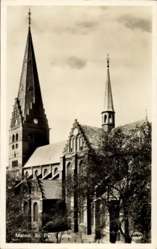 Ak Malmö Schweden, St. Pauli Kirche,  Uhrturm, Bäume