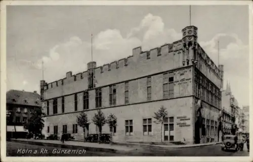 Ak Köln am Rhein, Köln a. Rh. Gürzenich,  Gebäude, Autos, Bäume