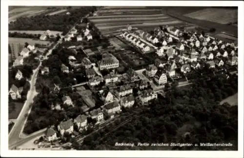 Ak Backnang in Württemberg, Luftaufnahme, Häuser, Straßen, grüne Felder,  