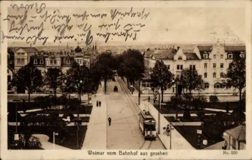 Ak Weimar in Thüringen,  Bahnhof, Straßenbahn, Bäume, Häuser