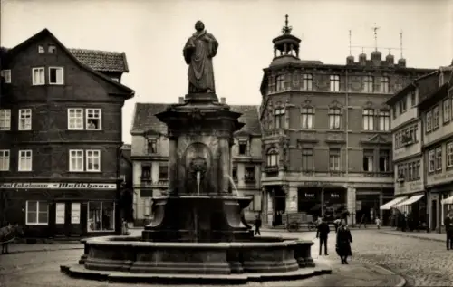 Ak Nordhausen am Harz, Lutherplatz, Statue,  Architektur, Einkaufsstraße, Nordhausen