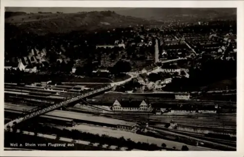 Ak Weil am Rhein, Luftaufnahme von  Rhein, Gebäude, Eisenbahn