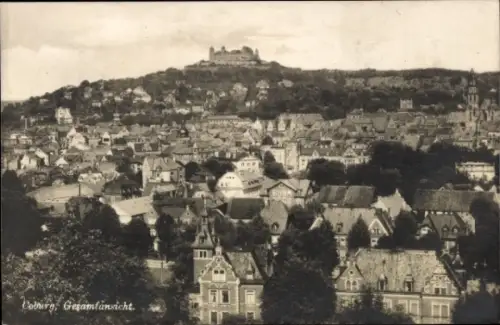 Ak Coburg in Oberfranken,  Gesamtansicht, Stadtansicht, Veste Coburg im Hintergrund