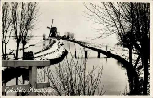 Ak Niederlande, Windmühle im Winter, Neujahr
