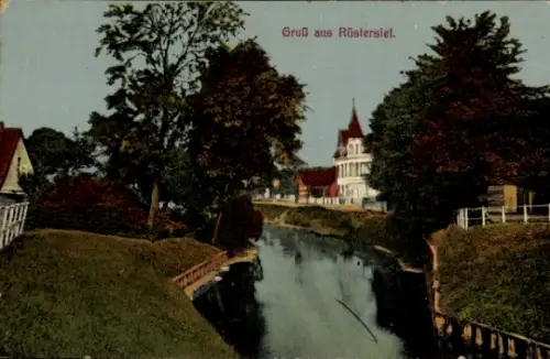 Ak Rüstersiel Wilhelmshaven an der Nordsee, Fluss, Bäume, Gebäude, 'Gruß aus Rüstersiel.'