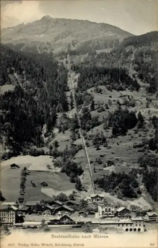 Ak Mürren Kanton Bern Schweiz, Drahtseilbahn nach  Berglandschaft, Häuser im Vordergrund
