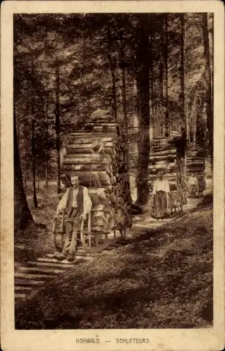 Ak Hohwald im Elsass, Schlitteurs, Männer beim Holzrücken im Wald