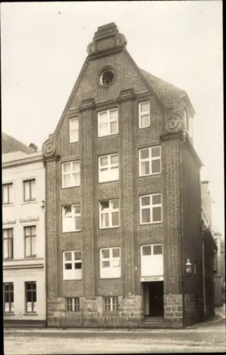 Foto Ak Hansestadt Lübeck, Kontor Wilhelm Brunow an der Untertrave Ecke Clemensstraße, ca. 1929