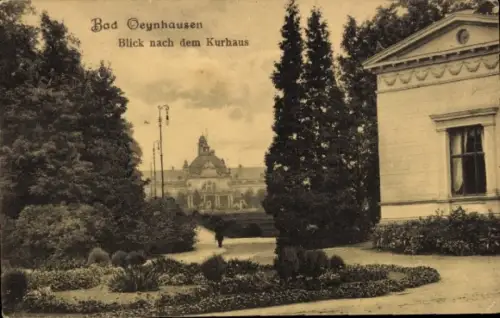 Ak Bad Oeynhausen in Westfalen,  Blick nach dem Kurhaus, Parklandschaft, Bäume, Weg