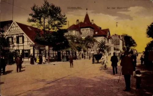 Ak Duisburg im Ruhrgebiet, Vorderseite zeigt Straße, Menschen, Gebäude, Monning, Duisburg