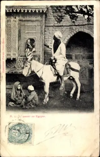 Ak Ägypten, Mann auf einem Esel; Frau schaut aus dem Fenster