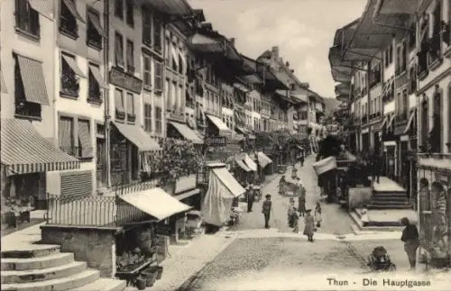 Ak Thun Kanton Bern Schweiz,  Hauptgasse, Straßenansicht, Geschäfte, Menschen,  