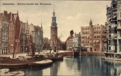 Ak Amsterdam Nordholland Niederlande,  Binnen-Amstel, Munttoren, Wasser, Boote,  Gebäude