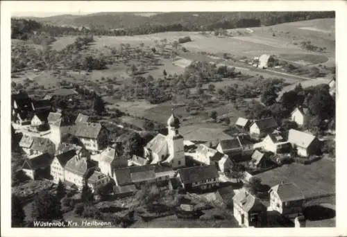 Ak Wüstenrot in Württemberg, Luftaufnahme von  Kirche, Häuser, ländliche Umgebung