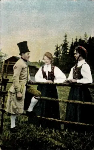 Ak Mann und zwei Frauen in norwegischer Tracht