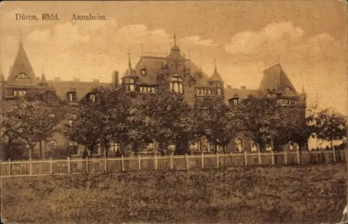 Ak Düren im Rheinland,  Rhld., Annaheim, Gebäude mit Bäumen und Zaun
