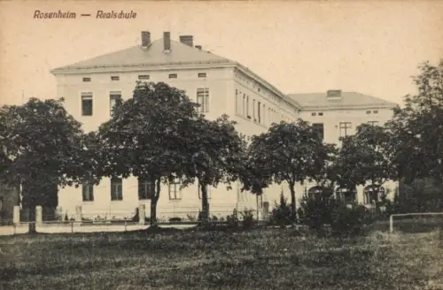 Ak Rosenheim Oberbayern,  Realschule, Gebäude mit Bäumen,  