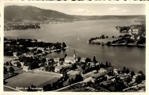 Ak Egern am Tegernsee Oberbayern, Landschaftsaufnahme, Tegernsee, Egern, Kirche, Bäume, Wasser
