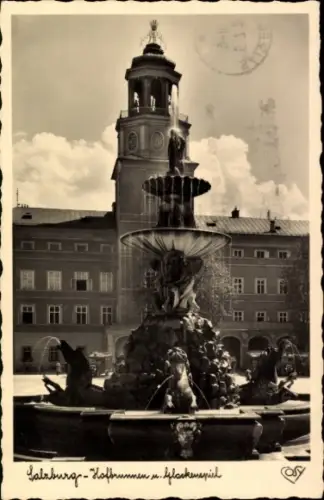 Ak Salzburg in Österreich, Brunnen mit Figuren, Turm im Hintergrund,  aus  1939