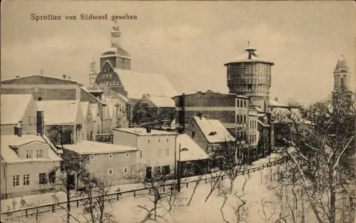 Ak Szprotawa Sprottau Schlesien, Schneebedeckte Stadtansicht, Wasserbehälter, Kirchen, Häuser