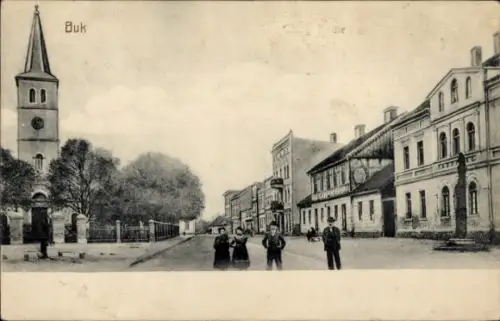 Ak Buk Polen, Kirche, Straßenpartie