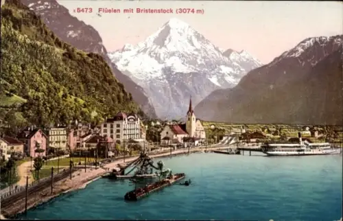Ak Flüelen Kanton Uri Schweiz,  Bristenstock, Berge, See, Hafen, Schiffe